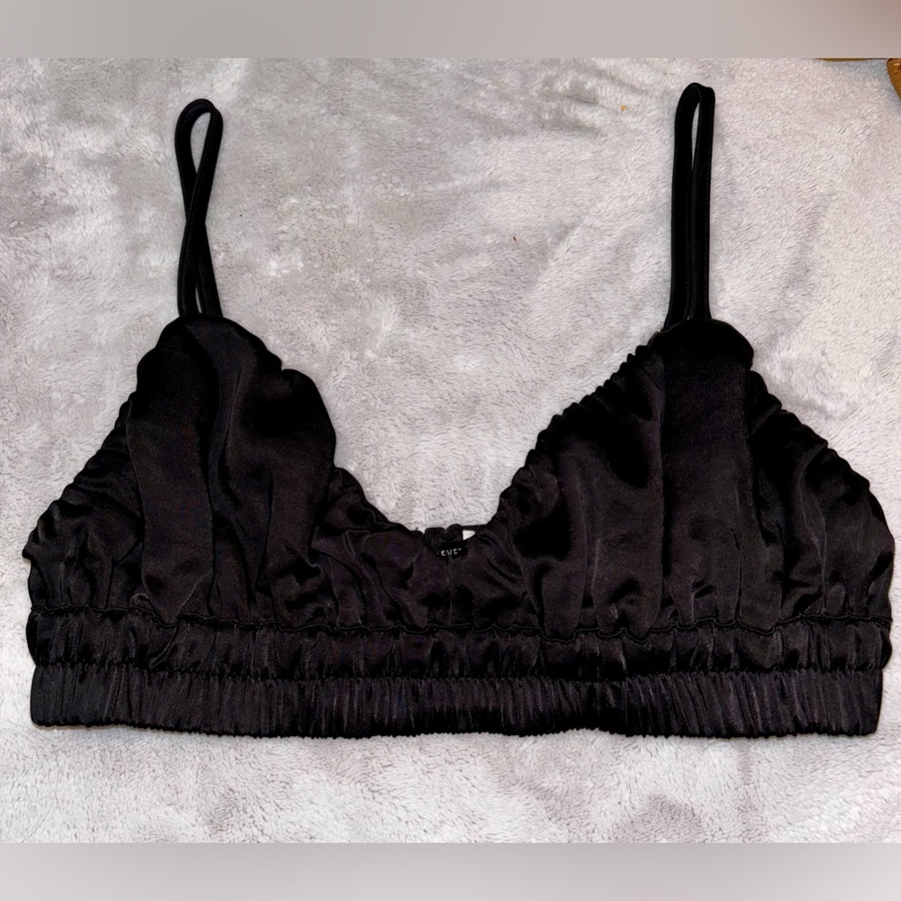 Black going out top